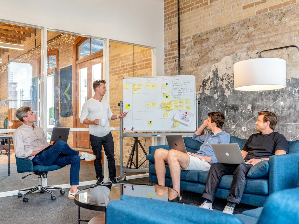 Marketing team reviewing landing page test results together