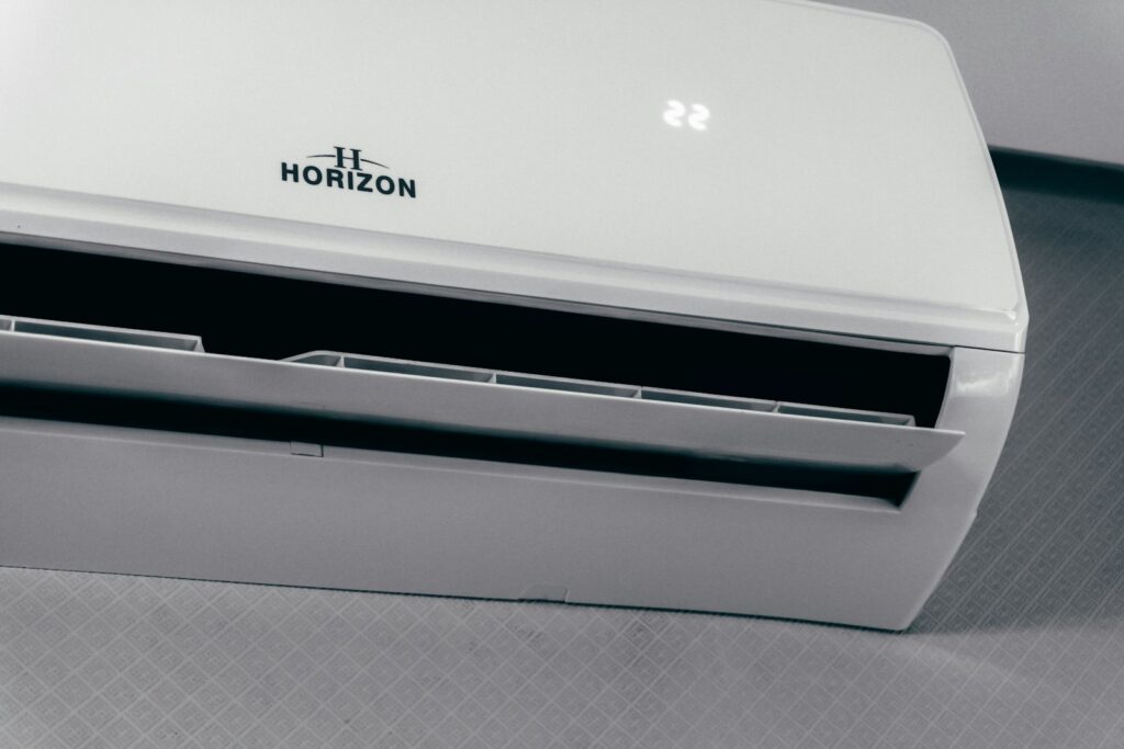 Wall-mounted air conditioner displaying 22 degrees
