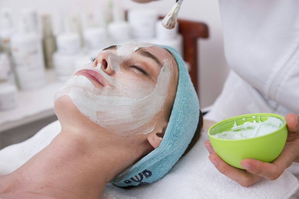 Woman receiving a facial skin treatment