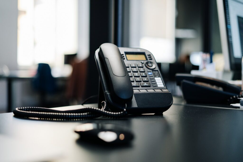 Office desk phone waiting for calls from ad leads