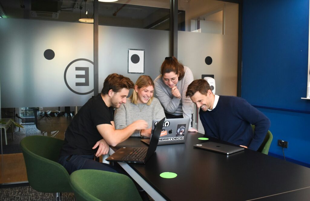 Marketing team meeting to plan a local business campaign