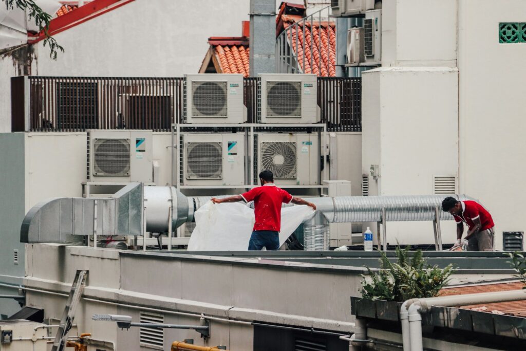 HVAC technicians working on a rooftop unit, the jobs good HVAC marketing books