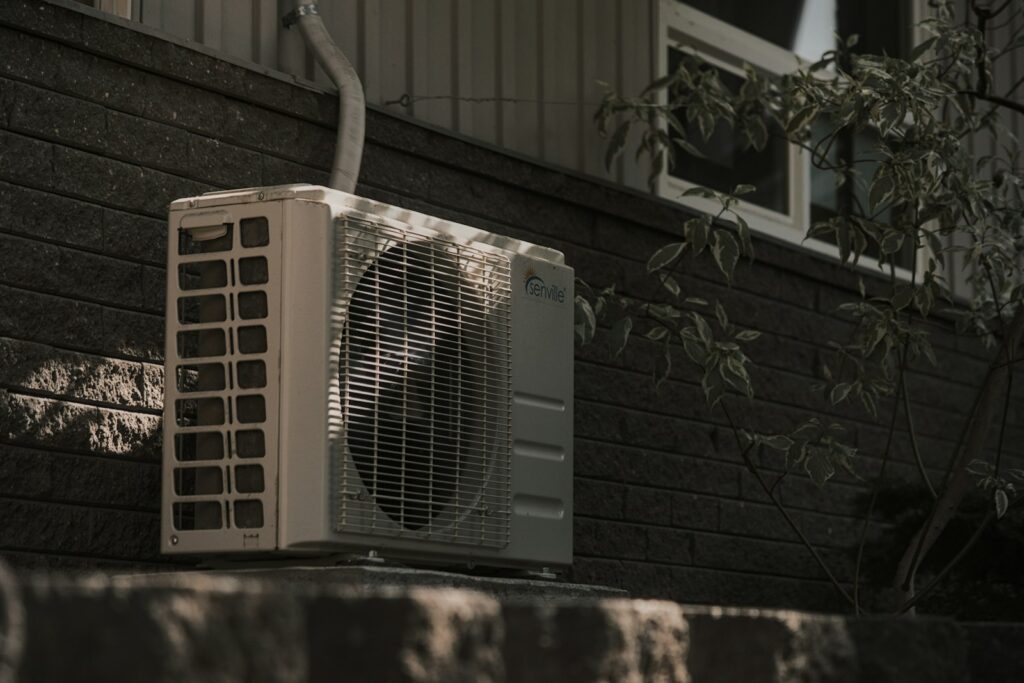 Air conditioner unit outside a home ready for a seasonal tune-up