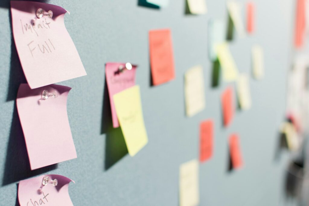 Sticky notes on a board mapping out marketing funnel stages