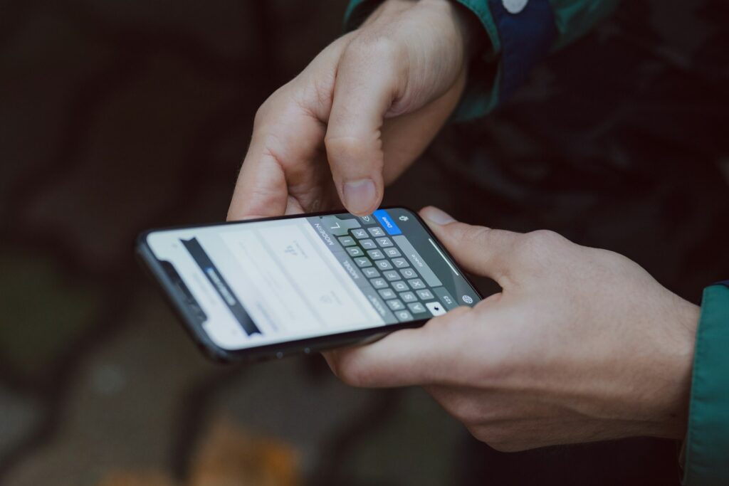 Customer reading a text message from a local business